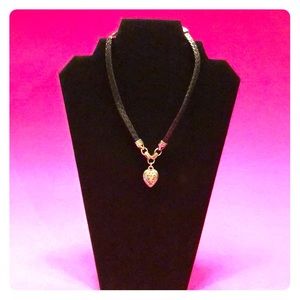 Silver and black heart necklace.